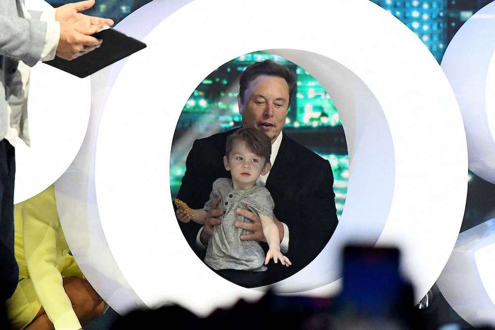 Elon-Musks-Son-X-Hangs-onto-Dad-During-Miami-Panel-Appearance-041923-1-fa7c34c24daa48aab6ece836d291f63c